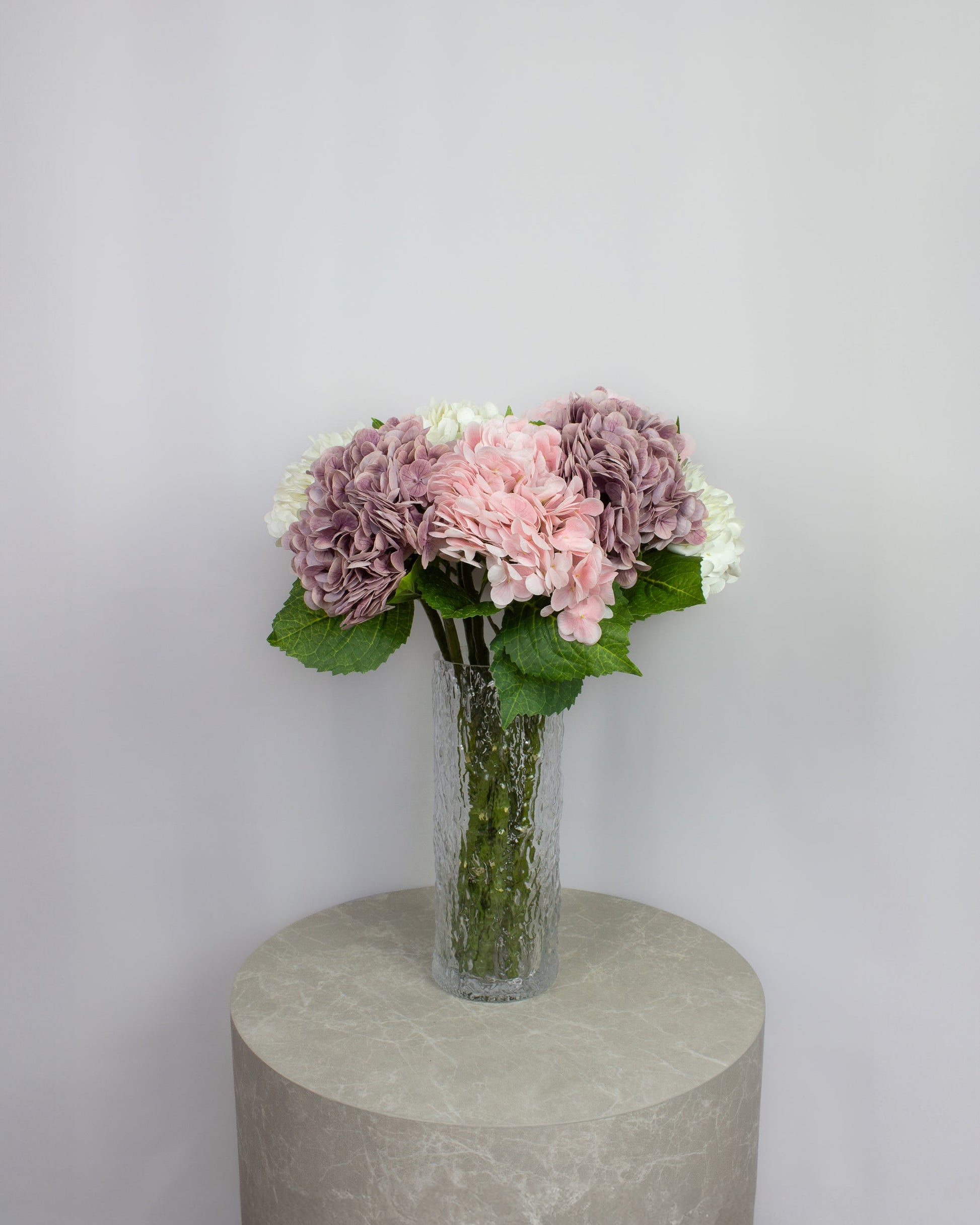 Kunstig hortensia i lyserød og lilla farver 
